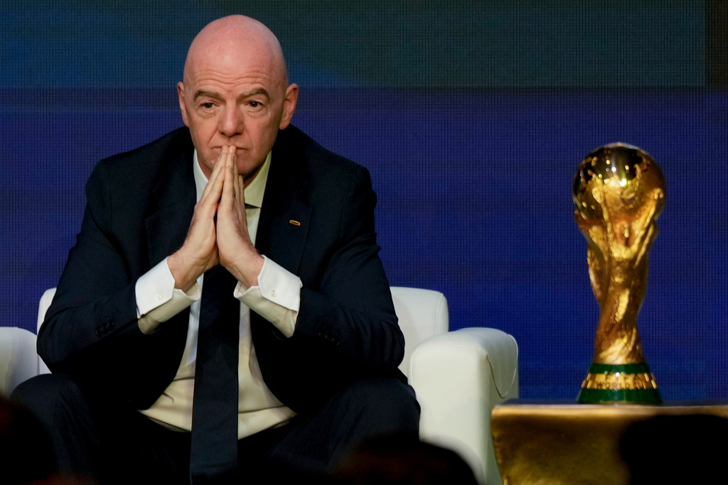 FIFA President Gianni pauses during the match schedule reveal for the 2026 soccer World Cup in Washington, Saturday, Dec. 6, 2025. (AP Photo/Chris Carlson)