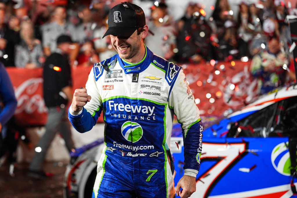 Daniel Suarez celebrates in Victory Lane after winning a NASCAR Cup Series auto race, Sunday, May 24, 2026, in Charlotte, N.C. (AP Photo/Matt Kelley)