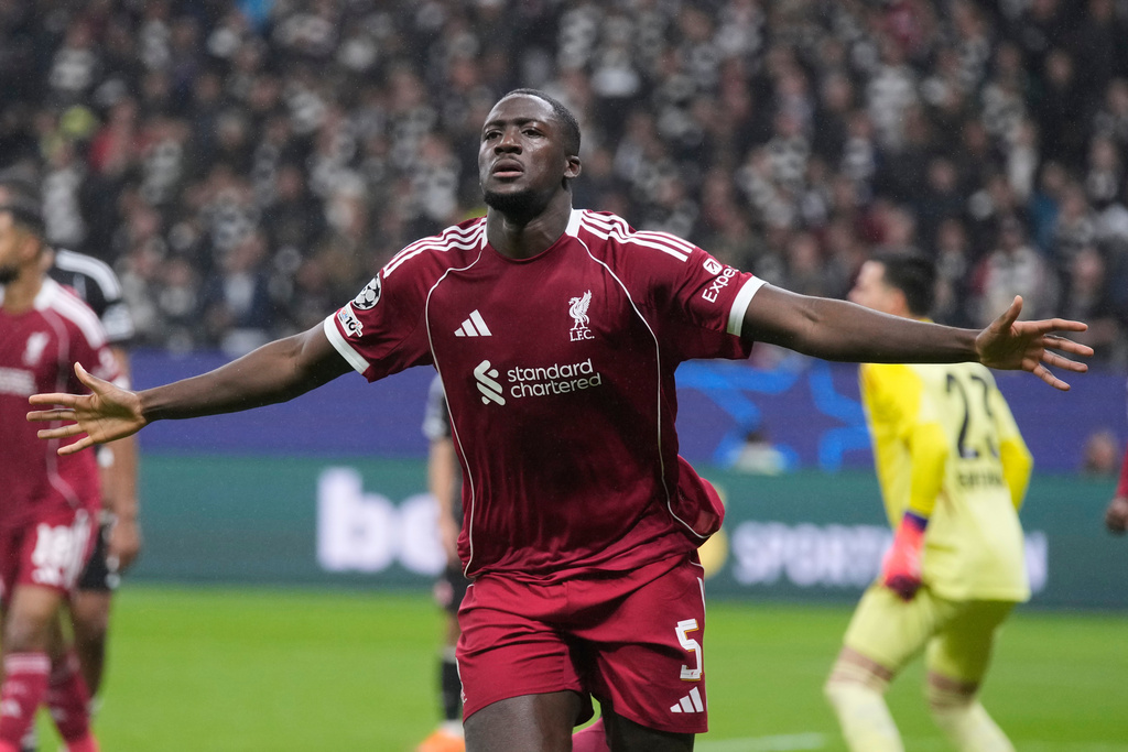 Liverpool's Ibrahima Konate celebrates after scoring his side's third goal during the Champions League opening phase soccer match between Eintracht Frankfurt and Liverpool in Frankfurt, Germany, Wednesday, Oct. 22, 2025. (AP Photo/Michael Probst)