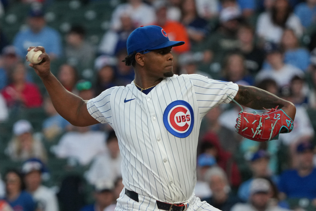 Chicago Cubs pitcher Edward Cabrera (30) pitches against the Los Angeles Angels during the first inning in a baseball game Monday, March 30, 2026, in Chicago. (AP Photo/David Banks)