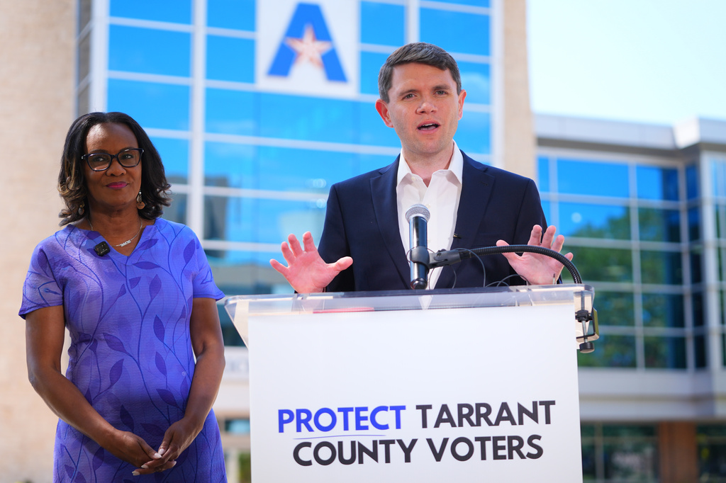 Democratic Senate candidate James Talarico, right, speaks with Tarrant County Commissioner Alisa Simmons during a news conference at UTA, Sunday, Aug. 30, 2026, in Arlington, Texas. (AP Photo/LM Otero)