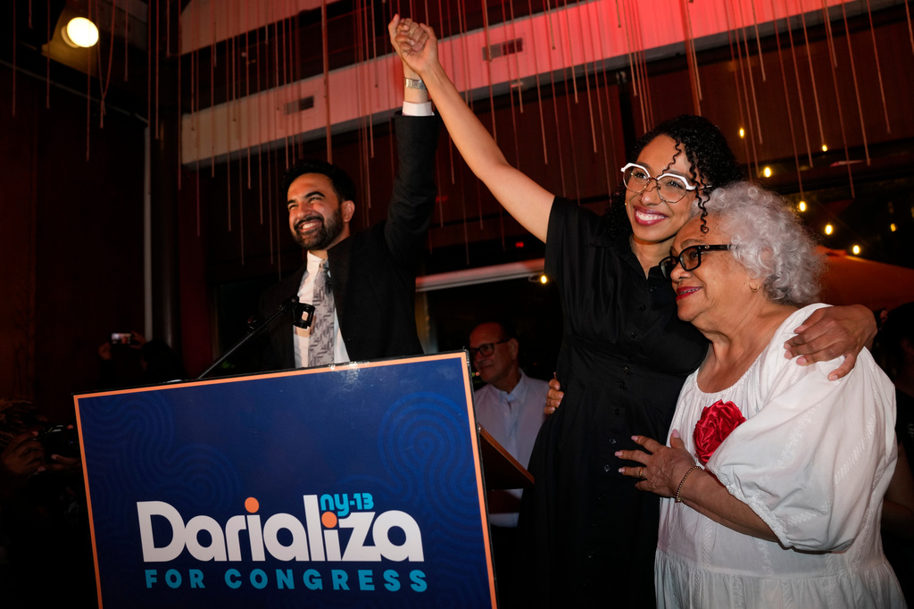 New York City Mayor Zohran Mamdani celebrates with Democratic congressional candidate Darializa Avila Chevalier and organizer Carmen Rojas during an election night watch party Tuesday, June 23, 2026, in New York. (AP Photo/Seth Wenig)