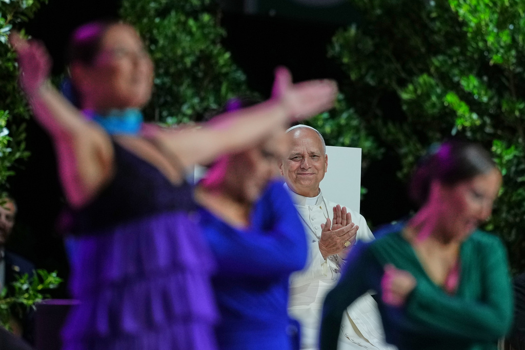 Spanish Flamenco dancers perform for Pope Leo XIV during the meeting "Building networks with the world of culture, art, economy and sport" at the Movistar Arena in Madrid, Spain, Sunday, June 7, 2026 (AP Photo/Alessandra Tarantino)