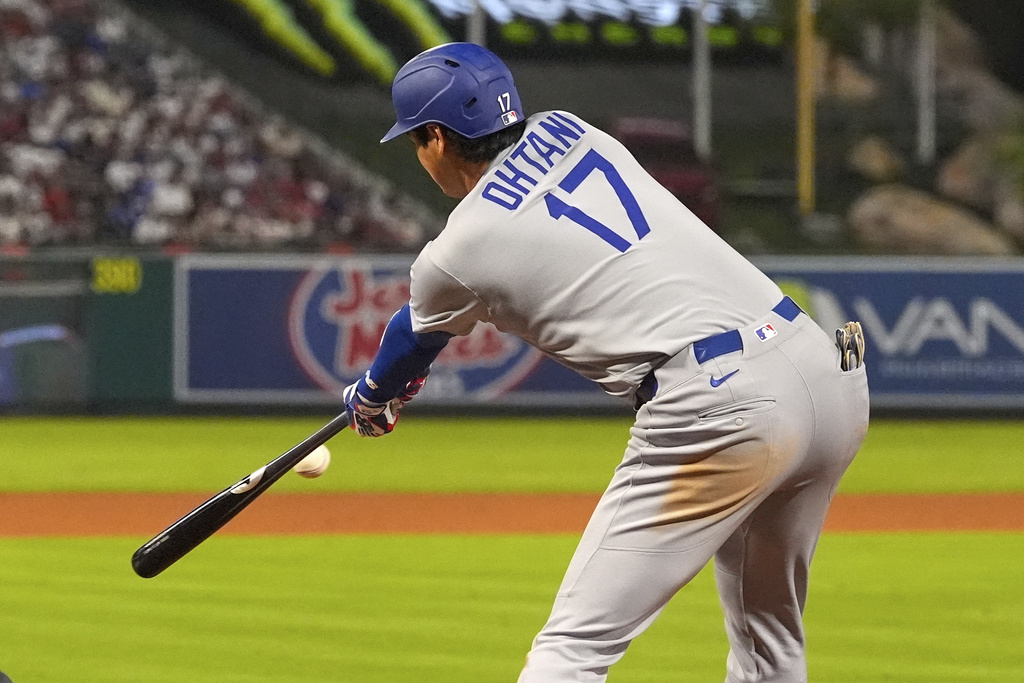 Los Angeles Dodgers' Shohei Ohtani hits into a triple play during the sixth inning of a baseball game against the Los Angeles Angels, Tuesday, Aug. 12, 2025, in Anaheim, Calif. (AP Photo/Mark J. Terrill)