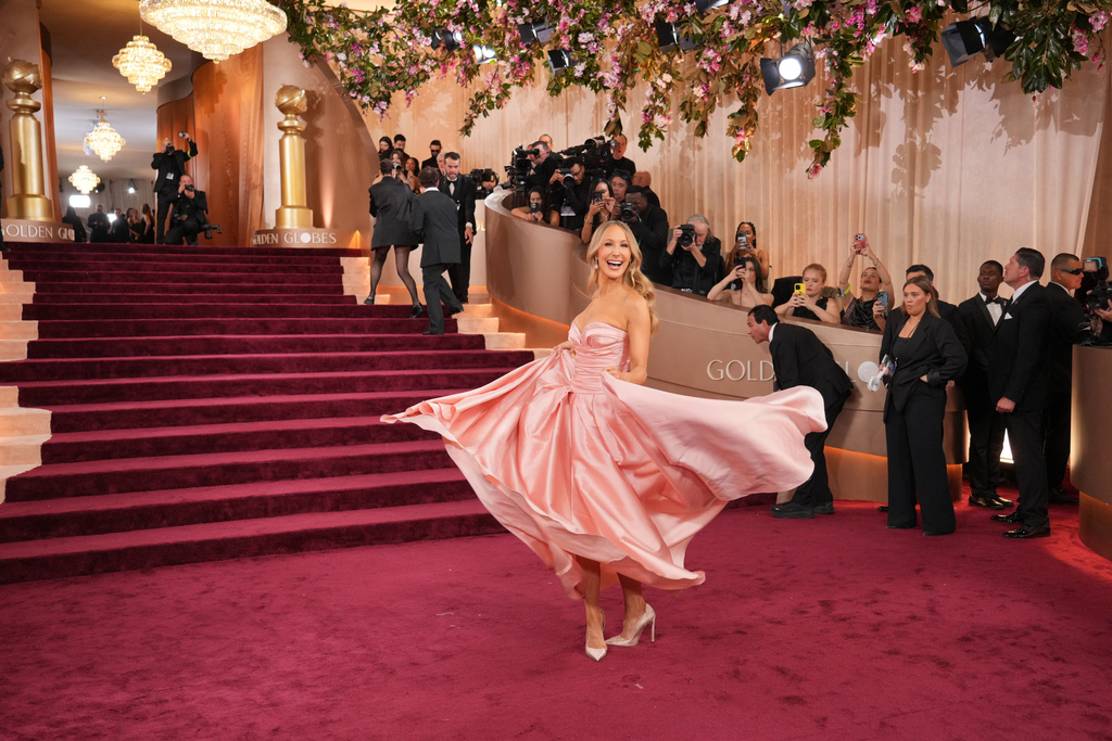 Nikki Glaser arrives at the 83rd Golden Globes on Sunday, Jan. 11, 2026, at the Beverly Hilton in Beverly Hills, Calif. (Photo by Jordan Strauss/Invision/AP)