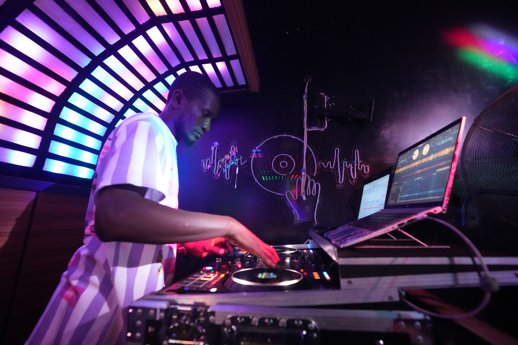 A DJ plays music inside a nightclub in Sokoto, Nigeria, July 18, 2026. (AP Photo/Sunday Alamba)