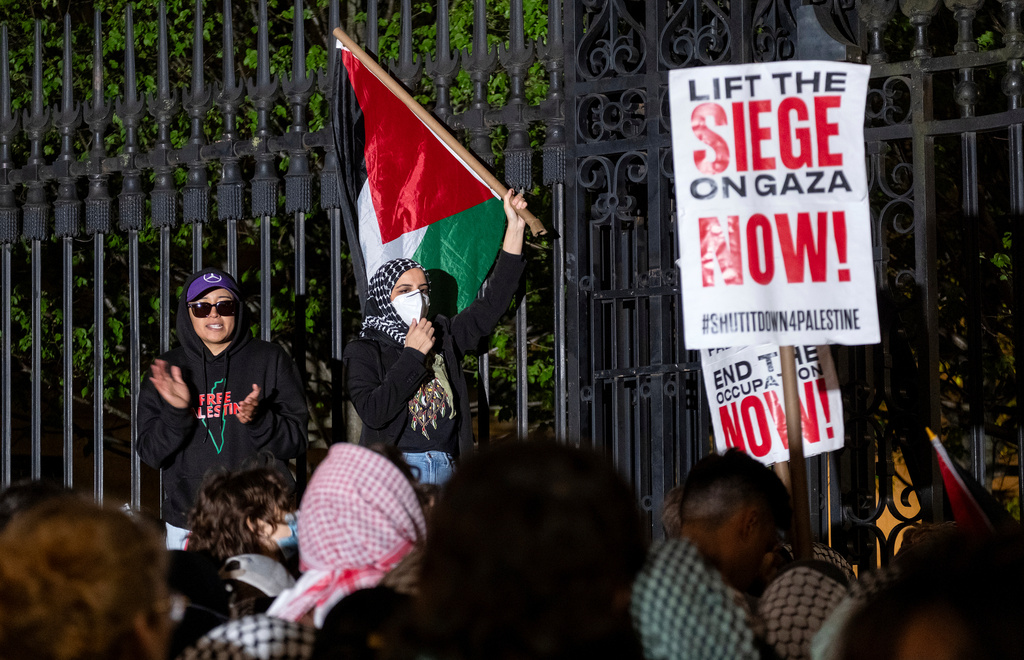 FILE - Leqaa Kordia, right, demonstrates with pro-Palestianian protesters as they gather near a main gate at Columbia University in New York, Tuesday, April 30, 2024, just before New York City police officers cleared the area after a building was taken over by protesters earlier in the day. (AP Photo/Craig Ruttle, File)