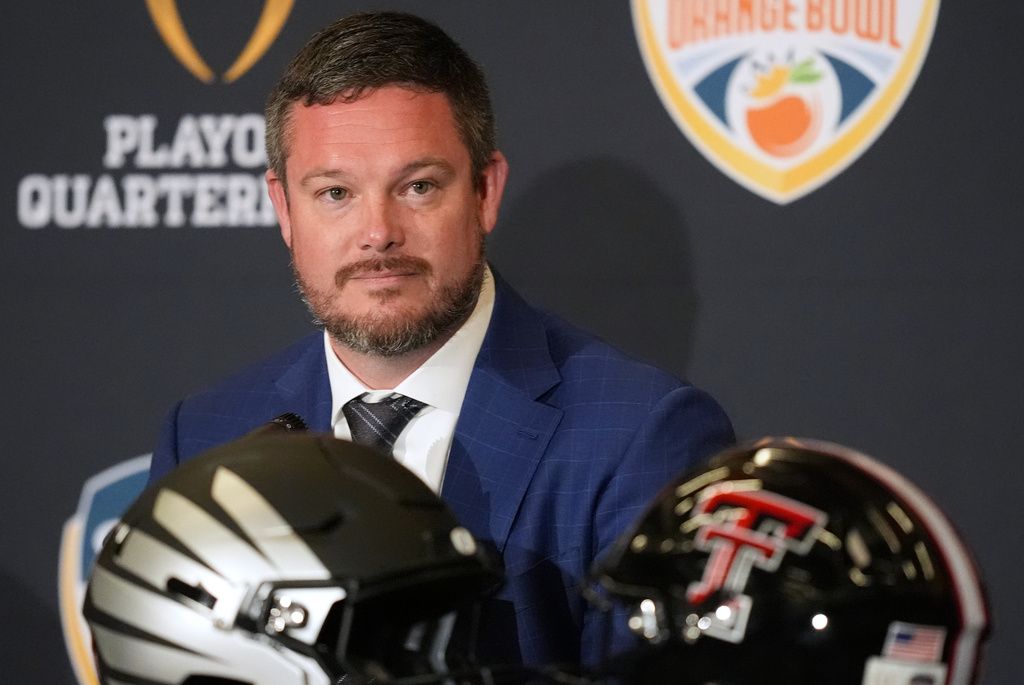 Oregon head coach Dan Lanning listens during a press conference ahead of an Orange Bowl College Football Playoff quarterfinal game against Texas Tech, Wednesday, Dec. 31, 2025, in Dania Beach, Fla. (AP Photo/Rebecca Blackwell)