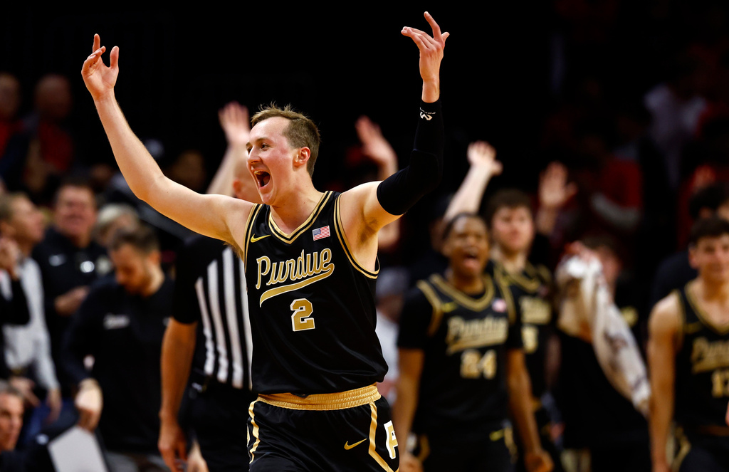 Fletcher Loyer (2) reacts after Purdue scored against Rutgers during the second half of an NCAA college basketball game, Tuesday, Dec. 2, 2025, in Piscataway, N.J. (AP Photo/Noah K. Murray)