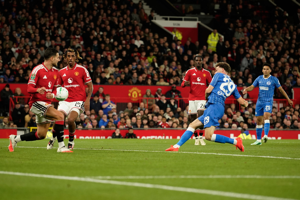 Brighton's Maxim De Cuyper, front right, scores his side's third goal during the English League Cup third round soccer match between Manchester United and Brighton and Hove Albion in Manchester, England, Wednesday, Sept. 16, 2026. (AP Photo/Dave Thompson)