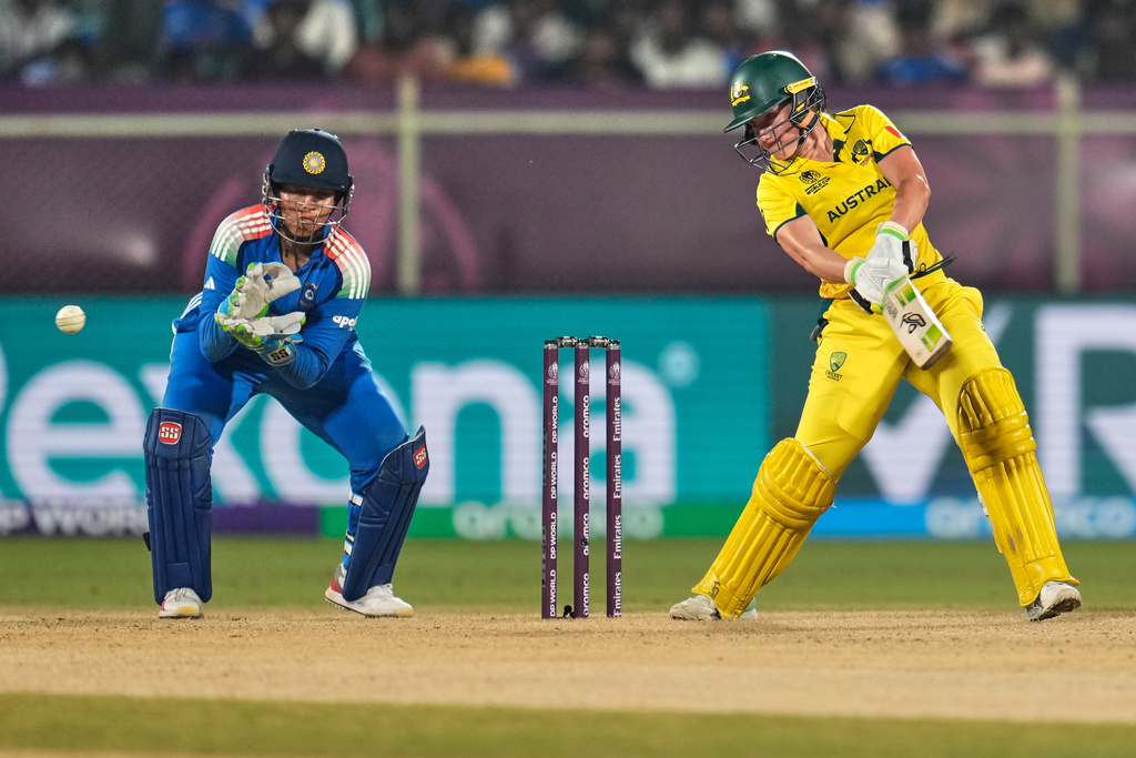 Australia's captain Alyssa Healy plays a shot during the ICC Women's Cricket World Cup match between India and Australia at ACA-VDCA Cricket Stadium in Visakhapatnam, India, Sunday, Oct. 12, 2025. (AP Photo/Aijaz Rahi)