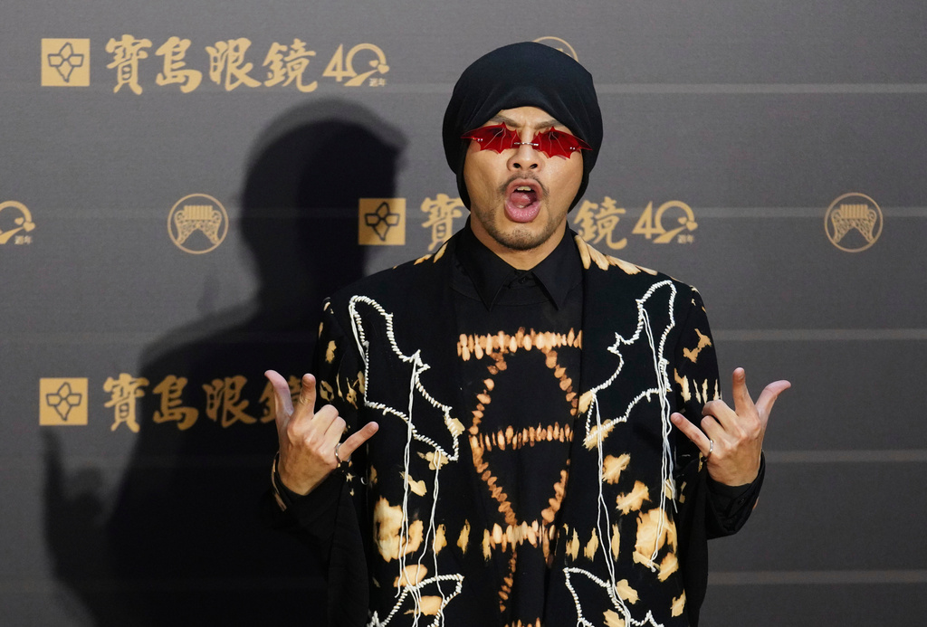 FILE - Malaysian singer Namewee poses as he arrives for the 31th Golden Melody Awards in Taipei, Taiwan, Saturday, Oct. 3, 2020. (AP Photo/Billy Dai, File)