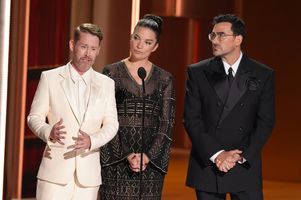 Macaulay Culkin, from left, Annie Murphy, and Dan Levy pay tribute to Catherine O'Hara during the 78th Emmy Awards on Monday, Sept. 14, 2026, at the Peacock Theater in Los Angeles. (AP Photo/Chris Pizzello)
