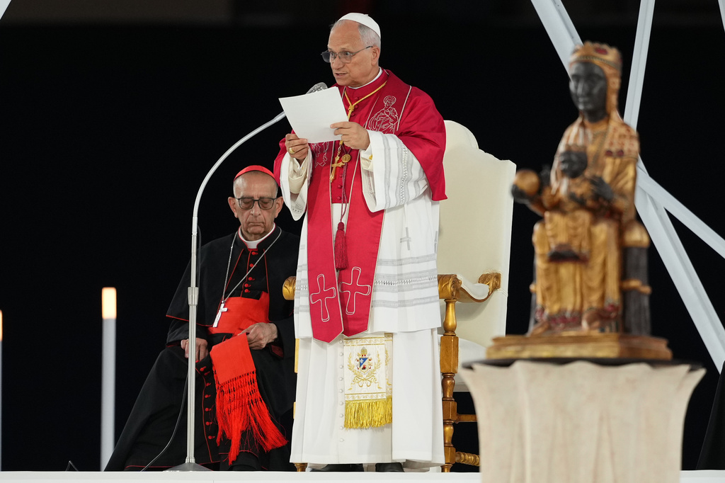Pope Leo XIV leads a vigil of prayer at the Lluis Companys Olympic Stadium, in Barcelona, Tuesday, June 9, 2026. (AP Photo/Alessandra Tarantino)