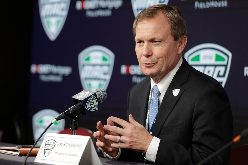 FILE - Mid-American Conference commissioner Jon Steinbrecher speaks to the media, March 12, 2020, in Cleveland. (AP Photo/Tony Dejak, File)