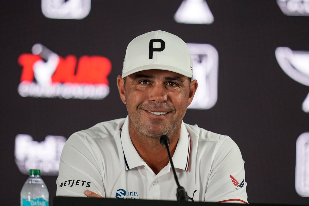 Gary Woodland speaks during a news conference at the Tour Championship golf tournament, Wednesday, Aug. 26, 2026, in Atlanta. (AP Photo/Mike Stewart)