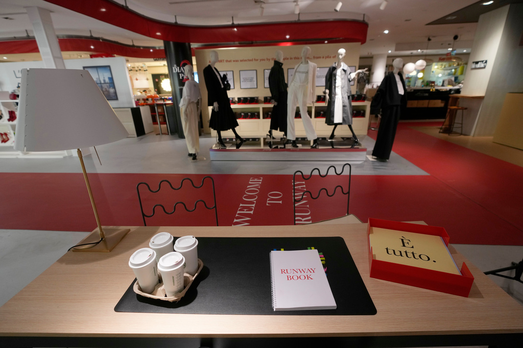 An installation of the new movie 'Devil Wears Prada 2' is displayed at La Rinascente shopping center, in Milan, Italy, Monday, April 20, 2026. (AP Photo/Luca Bruno)