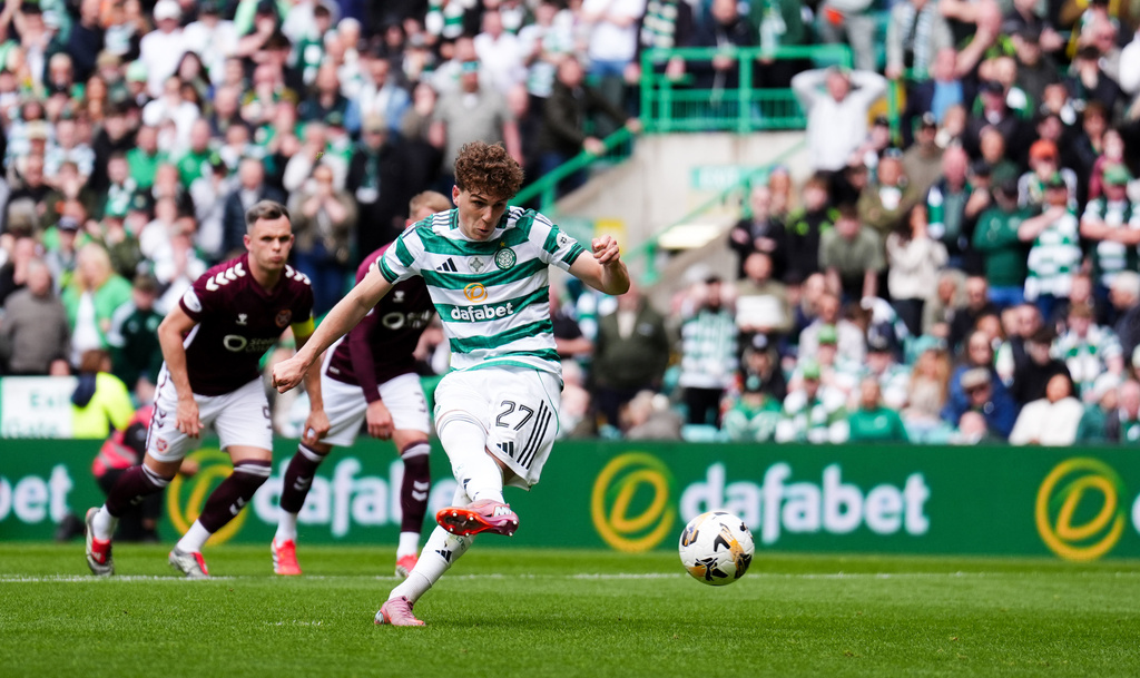 Celtic's Arne Engels scores from the penalty spot during the Premiership soccer match between Celtic and Heart of Midlothian, in Glasgow, Scotland, Saturday May 16, 2026. (Andrew Milligan//PA via AP)