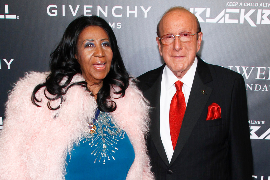 FILE - Aretha Franklin, left, and Clive Davis, attend Keep a Child Alive's 2014 Black Ball in New York on Oct. 30, 2014. (Photo by Andy Kropa/Invision/AP, File)