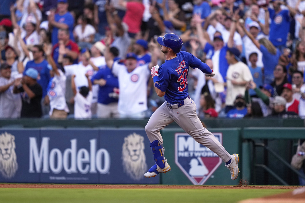 Chicago Cubs' Kyle Tucker rounds first after hitting a solo home run during the first inning of a baseball game against the Los Angeles Angels, Friday, Aug. 22, 2025, in Anaheim, Calif. (AP Photo/Mark J. Terrill)