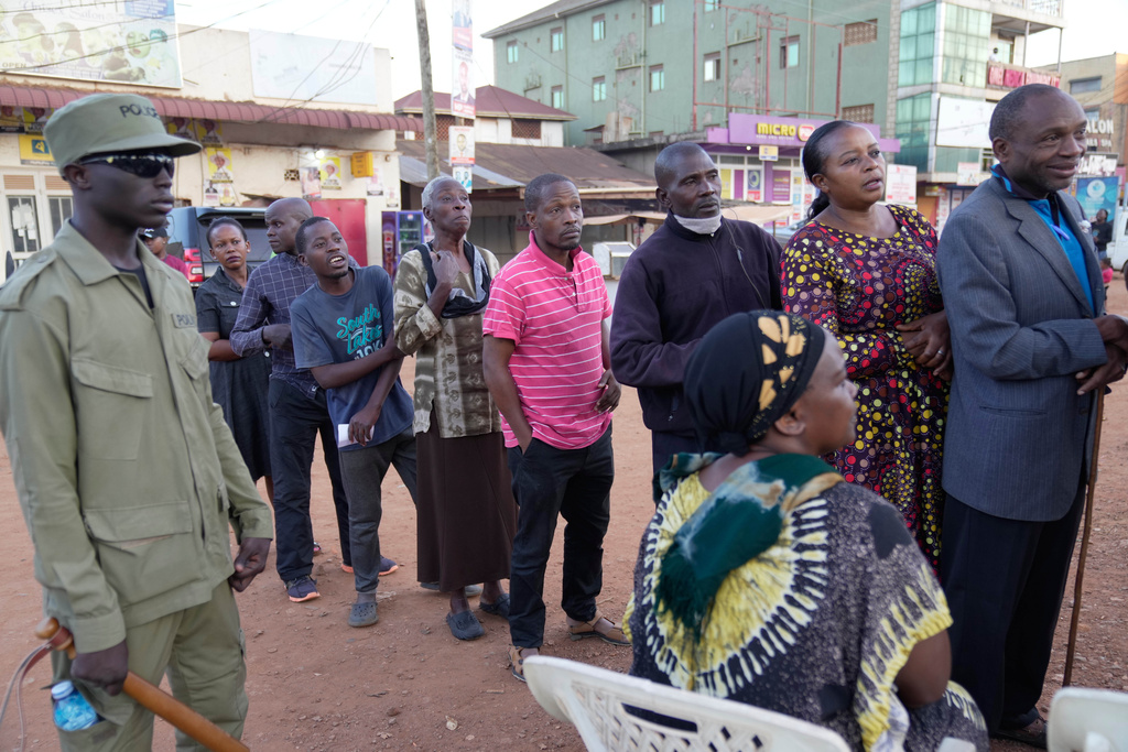 Voters wait to cast their ballots during the presidential election in Kampala, Uganda, Thursday, Jan. 15, 2026. (AP Photo/Brian Inganga)