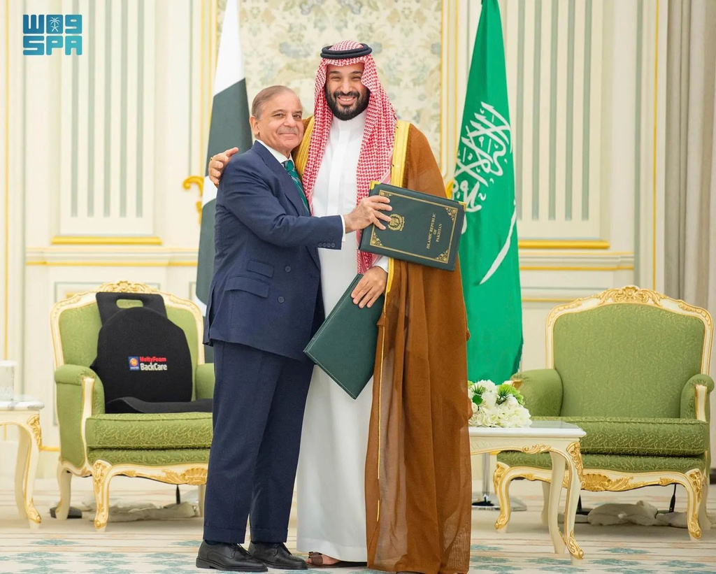 FILE - This handout photograph released by the state-run Saudi Press Agency shows Pakistani Prime Minister Shehbaz Sharif, left, embracing Saudi Arabia's Crown Prince Mohammed bin Salman after signing a joint defense pact in Riyadh, Saudi Arabia, Wednesday, Sept. 17, 2025. (Saudi Press Agency via AP, file)
