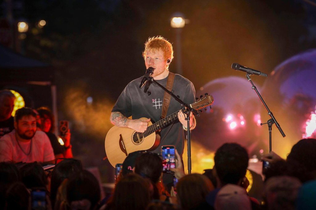 FILE - Singer-songwriter Ed Sheeran performs during "Ed Sheeran's Play: Live from New York" presented by TikTok at Domino Square in the Brooklyn borough of New York, Sept. 13, 2025. (Photo by Andy Kropa/Invision/AP, File)