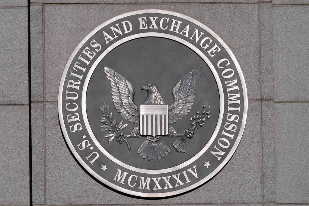 FILE - The seal of the U.S. Securities and Exchange Commission is seen on the building in Washington, Dec. 3, 2024. (AP Photo/Jose Luis Magana, File)