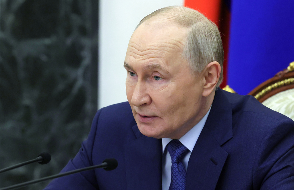 Russian President Vladimir Putin holds a meeting on economic issues at the Kremlin in Moscow, Russia, Friday, May 15, 2026. (Mikhail Metzel, Sputnik, Kremlin Pool Photo via AP)