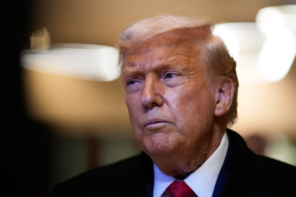 President Donald Trump returns from a meeting about Greenland during the Annual Meeting of the World Economic Forum in Davos, Switzerland, Wednesday, Jan. 21, 2026. (AP Photo/Markus Schreiber)