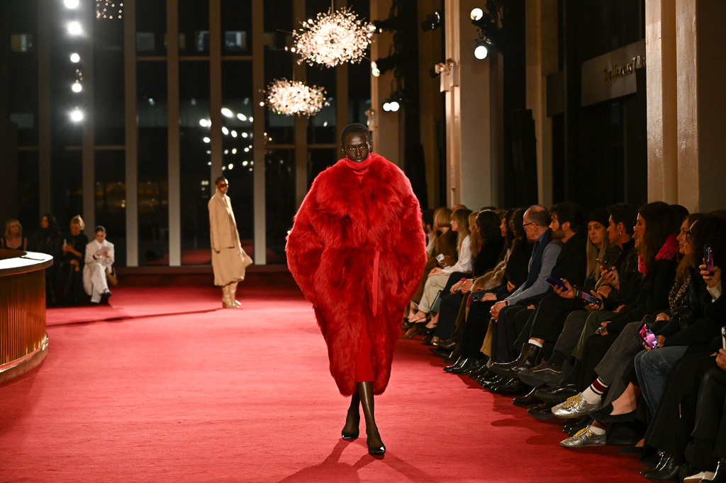 A model walks the runway during the Michael Kors Fall/Winter 2026 fashion show as part of New York Fashion Week, Thursday, Feb. 12, 2026, in New York. (Photo by Evan Agostini/Invision/AP)