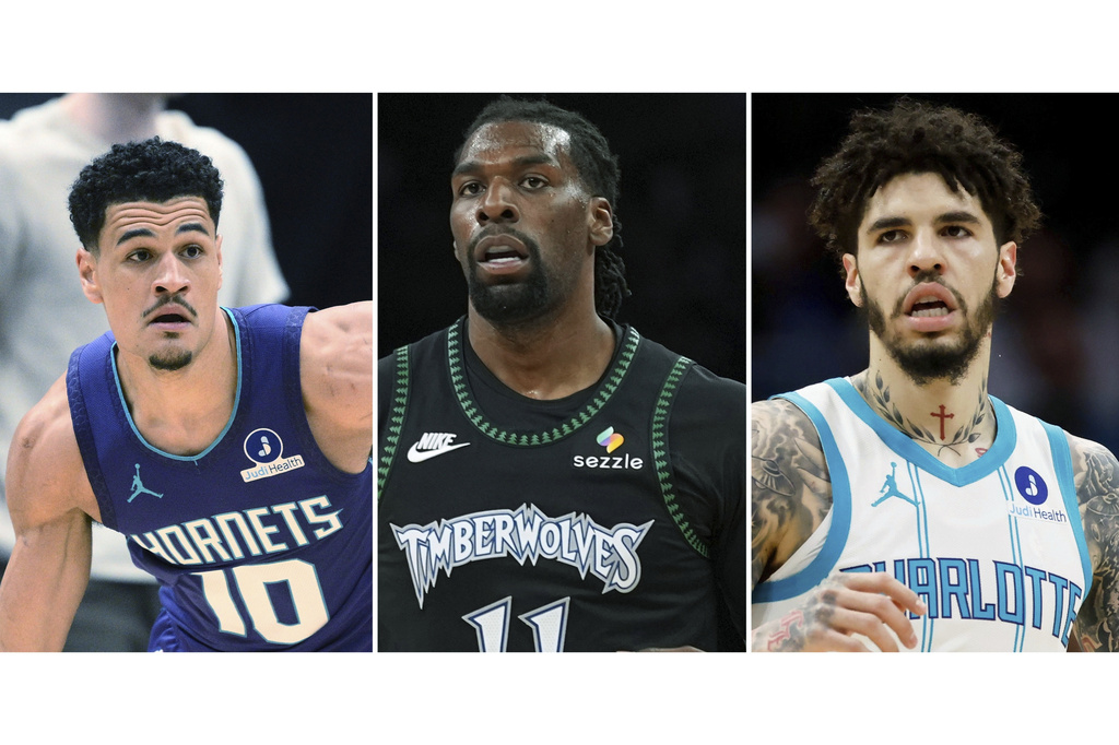 FILE - This photo combination shows, from left, Charlotte Hornets guard Josh Green (10), Feb. 22, 2026, in Washington, Minnesota Timberwolves center Naz Reid, May 8, 2026, in Minneapolis and Charlotte Hornets guard LaMelo Ball in Charlotte, N.C., April 14, 2026 (AP Photo/Nick Wass, Abbie Parr, Nell Redmond, file)