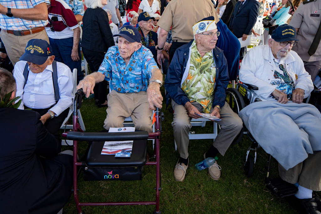 FILE - From left to right, Pearl Harbor survivors Harry Chandler, Ken Stevens, Herb Elfring and Ira "Ike" Schab sit during the 82nd Pearl Harbor Remembrance Day ceremony Dec. 7, 2023, at Pearl Harbor in Honolulu, Hawaii. (AP Photo/Mengshin Lin, File)