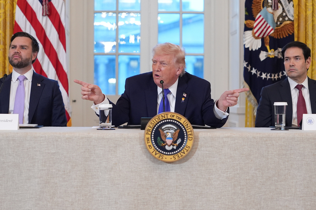 President Donald Trump speaks during a meeting with oil executives in the East Room of the White House, Friday, Jan. 9, 2026, in Washington, as Vice President JD Vance and Secretary of State Marco Rubio listen. (AP Photo/Evan Vucci)