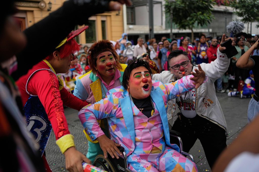 Clowns take part in National Clown Day celebrations in Lima, Peru, Monday, May 25, 2026. (AP Photo/Martin Mejia)