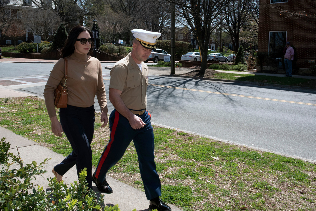 FILE - Marine Maj. Joshua Mast and his wife, Stephanie, arrive at Circuit Court, Thursday, March 30, 2023, in Charlottesville, Va. (AP Photo/Cliff Owen, File)