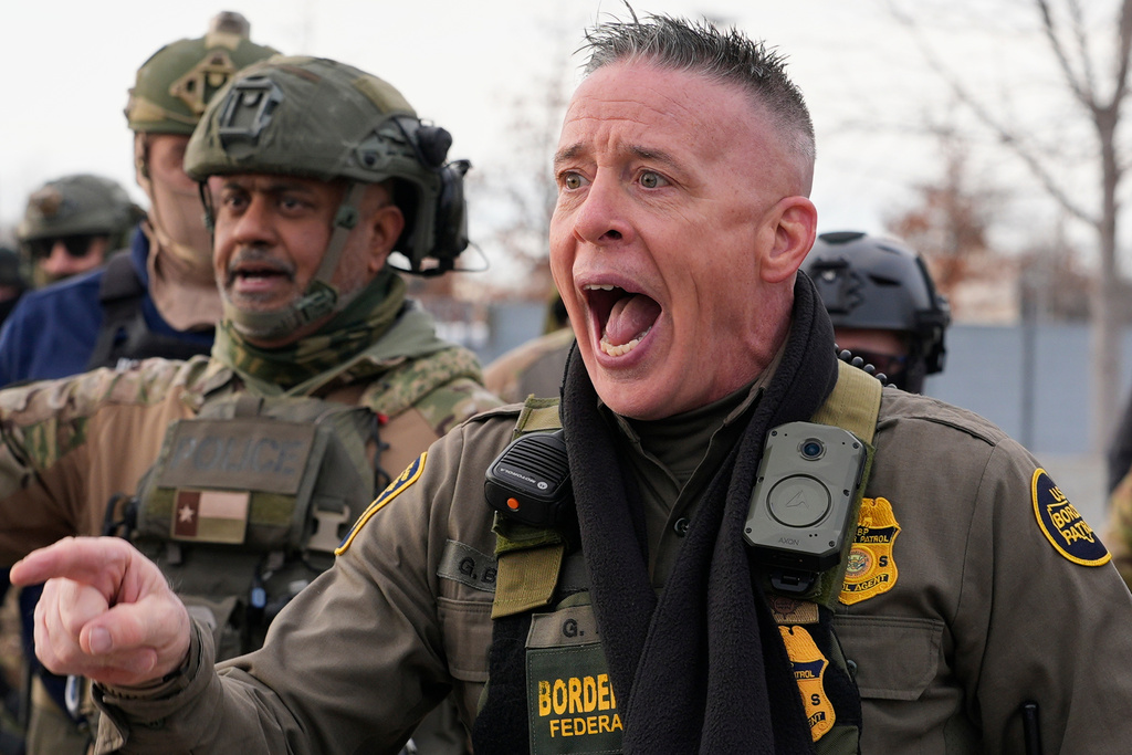 FILE - U.S. Border Patrol Cmdr. Gregory Bovino shouts at protesters, Jan. 11, 2026, in Minneapolis. (AP Photo/Jen Golbeck, File)