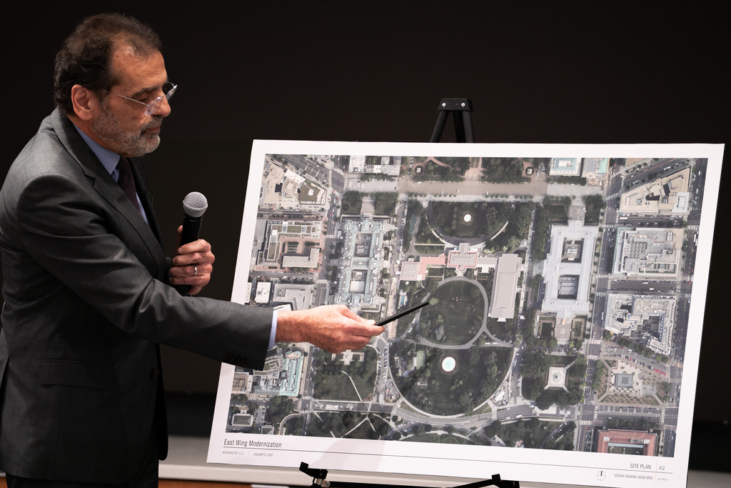 Architect Shalom Baranes points at a map on a board during a National Capitol Planning Commission meeting discussing the White House ballroom project, Thursday, Jan. 8, 2026, in Washington. (AP Photo/Allison Robbert)