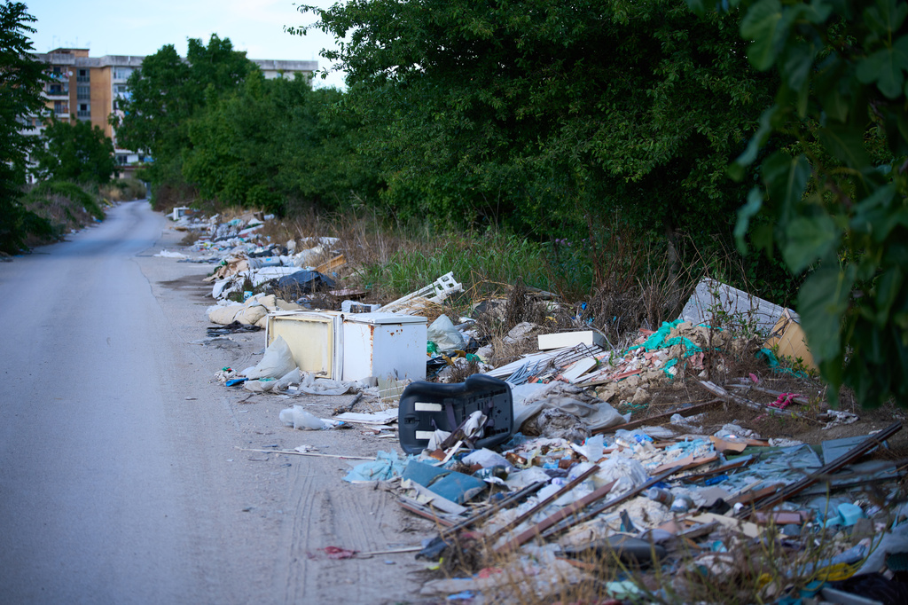 Illegal waste is seen on the side of a road in the outskirts of the southern Italian town of Acerra in the Terra dei Fuochi, or Land of Fires, an area scarred by decades of pollution from illegal waste dumping and burning, much of it linked to organized criminal groups, Friday, May 22, 2026, a day ahead of Pope Leo XIV's visit. (AP Photo/Andrew Medichini)