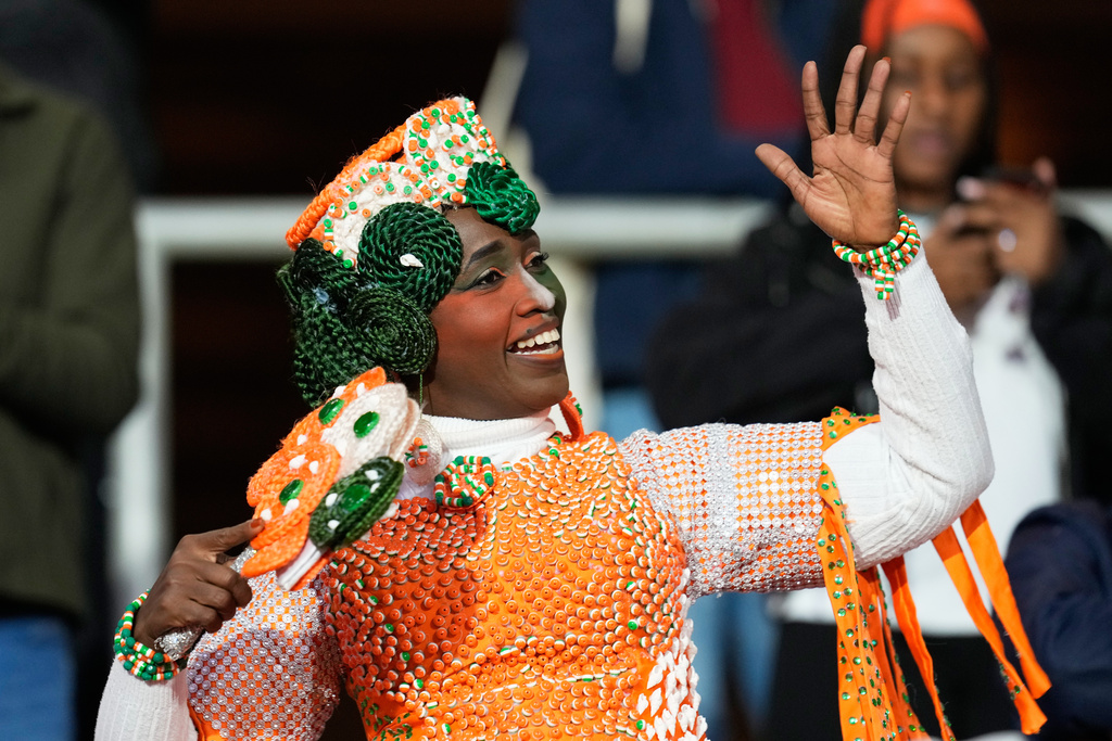 A fan cheers prior the Africa Cup of Nations best of 16 soccer match between Ivory Coast and Burkina Faso in Marrakech, Morocco, Tuesday, Jan. 6, 2026. (AP Photo/Themba Hadebe)