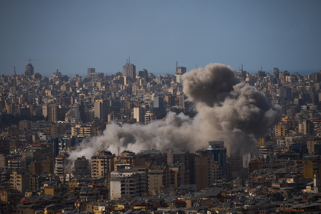 Smoke rises from Israeli airstrikes in Dahiyeh, a southern suburb of Beirut, Lebanon, Sunday, April 5, 2026. (AP Photo/Emilio Morenatti)