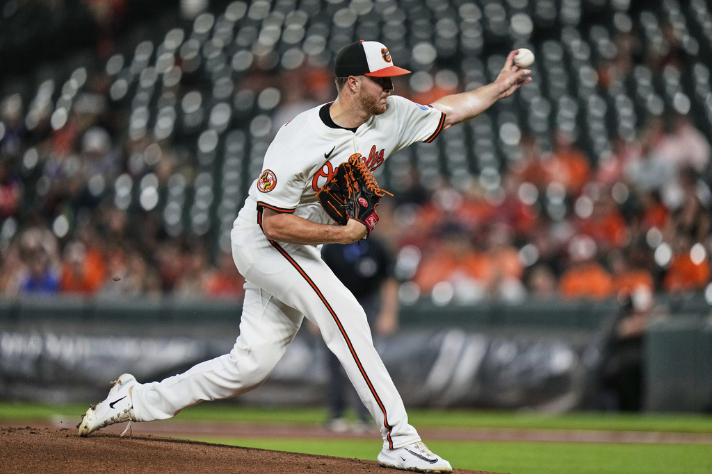 Baltimore Orioles starting pitcher Trevor Rogers delivers during the first inning of a baseball game against the Seattle Mariners, Wednesday, Aug. 13, 2025, in Baltimore. (AP Photo/Stephanie Scarbrough)