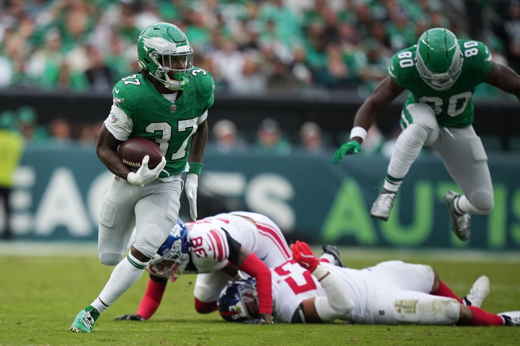 Philadelphia Eagles running back Tank Bigsby (37) runs with the ball during the second half of an NFL football game against the New York Giants on Sunday, Oct. 26, 2025, in Philadelphia. (AP Photo/Matt Slocum)