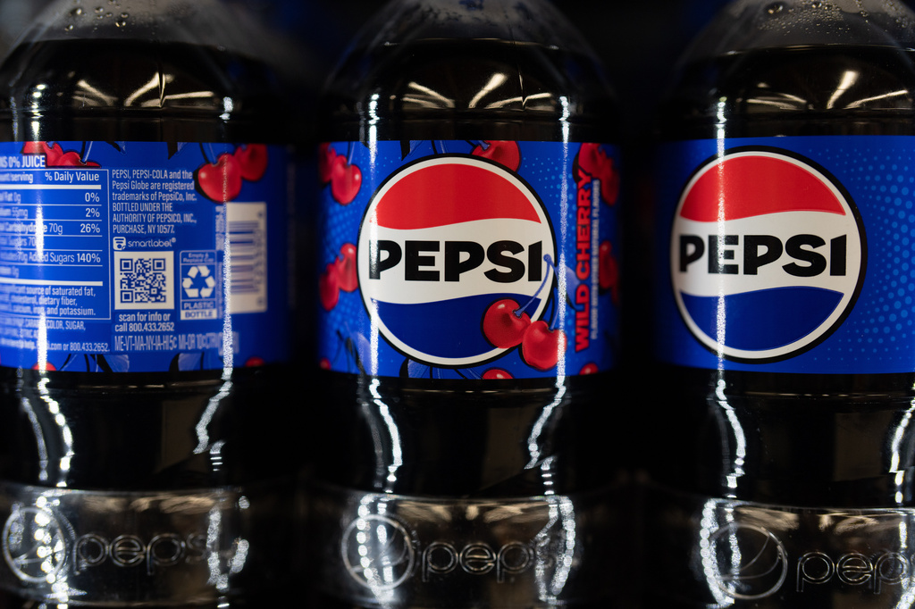 Bottles of Pepsi products are displayed for sale at Hawthorne Market on Tuesday, Jan. 6, 2026, in Portland, Ore. (AP Photo/Jenny Kane)