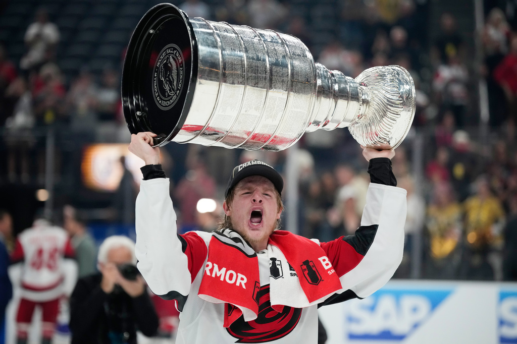Carolina Hurricanes right wing Jackson Blake (53) celebrates after a win over the Vegas Golden Knights in Game 6 of the NHL hockey Stanley Cup Final series, Sunday, June 14, 2026, in Las Vegas. (AP Photo/John Locher)