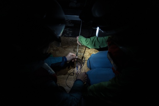 Researchers from the University of Washington prepare to deploy a 1.3-mile fiber-optic cable to test whether internet cables can detect endangered orca vocalizations near San Juan Island, Wash., Friday, Oct. 10, 2025. (AP Photo/Annika Hammerschlag) Researchers from the University of Washington prepare to deploy a 1.3-mile fiber-optic cable to test whether internet cables can detect endangered orca vocalizations near San Juan Island, Wash., Friday, Oct. 10, 2025. (AP Photo/Annika Hammerschlag)
