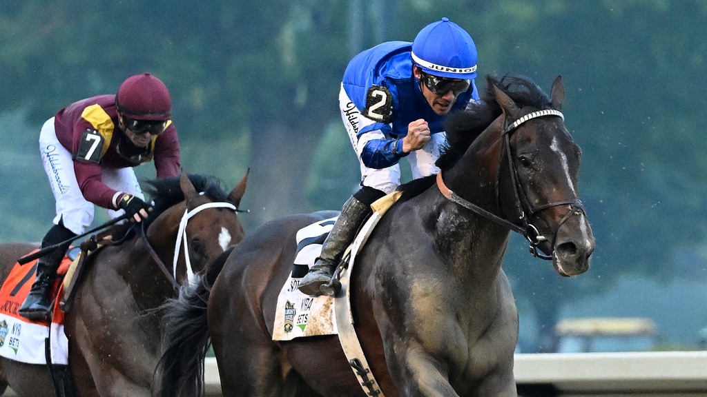 FILE - Jockey Junior Alvarado reacts aboard Sovereignty (2), as he crosses the finish line aboard Sovereignty (2) ahead of Journalism (7), with jockey Umberto Rispoli up, to win the 157th running of the Belmont Stakes horse race, Saturday, June 7, 2025, in Saratoga Springs, N.Y. (AP Photo/Jessica Hill, file)