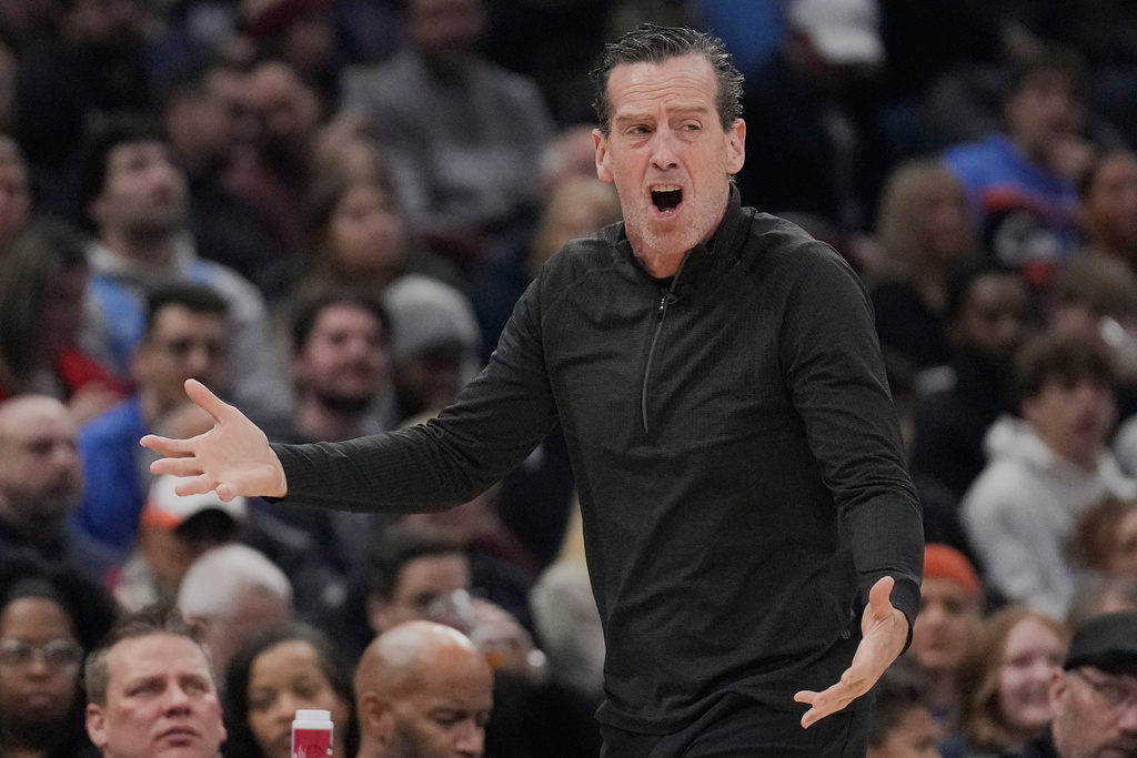 Cleveland Cavaliers head coach Kenny Atkinson gestures in the first half of an NBA basketball game against the Denver Nuggets Friday, Jan. 2, 2026, in Cleveland. (AP Photo/Sue Ogrocki)