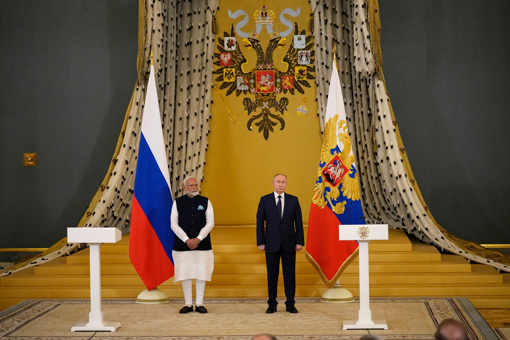 FILE - Indian Prime Minister Narendra Modi, left, and Russian President Vladimir Putin stand in a hall in the Kremlin in Moscow, Russia, on July 9, 2024. (AP Photo/Alexander Zemlianichenko, File)