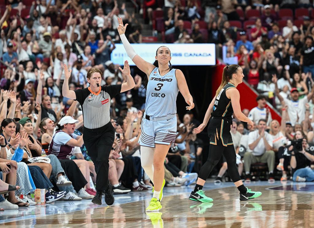 Toronto Tempo's Marina Mabrey (3) reacts after scoring a three-point shot during the second half of a WNBA basketball game against the New York Liberty in Montreal, on Sunday, July 12, 2026. (Graham Hughes/The Canadian Press via AP)